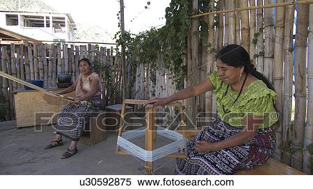 Stock Photography -  woman women guatemala weaving preparing thread . Fotosearch