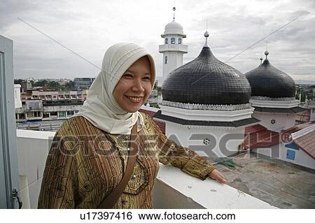Stock Photograph -  woman women indonesia great mosque banda aceh 2 . Fotosearch