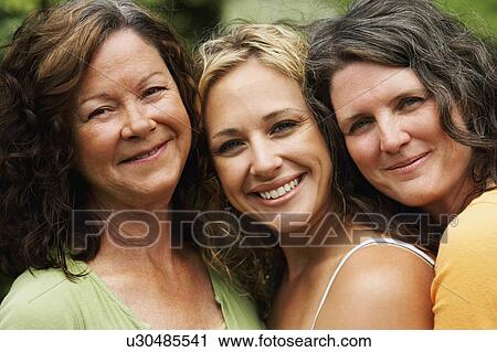 woman women portrait two mature smiling young View Large Photo Image Stock Image - woman women portrait two mature smiling young. Fotosearch