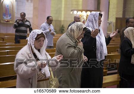 Stock Photo -  women egypt church mary queen world port said . Fotosearch