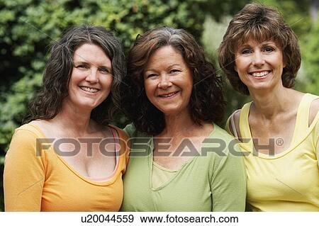 women portrait three mature smiling 45-49 years 55-59 View Large Photo Image Stock Photo - women portrait three mature smiling 45-49 years 55-59 . Fotosearch