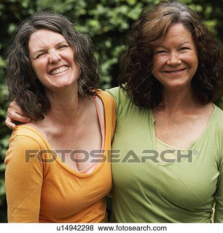 Stock Photo -  women portrait two mature smiling . Fotosearch