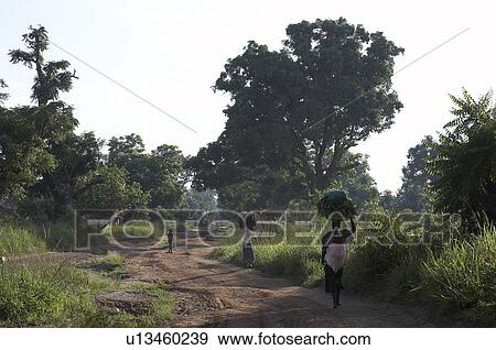 Stock Photo -  women south sudan walking road yei africa . Fotosearch