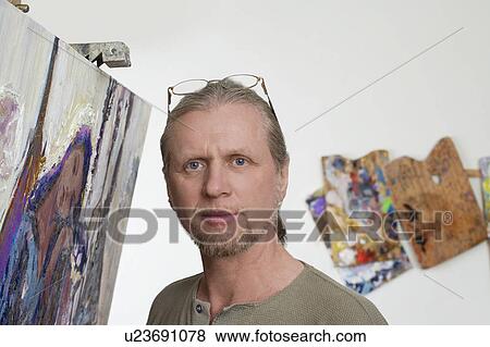 Artist with Painting View Large Photo Image Stock Photo - Artist with Painting. Fotosearch