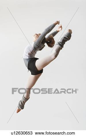 Ballerina Leaping in Mid-air View Large Photo Image Stock Image - Ballerina Leaping in Mid-air. Fotosearch