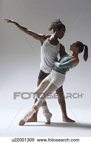 Ballet dancer supporting ballerina View Large Photo Image Stock Photo - Ballet dancer supporting ballerina. Fotosearch