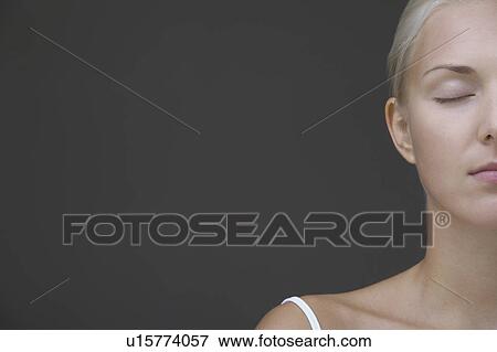 Beautiful young woman, headshot, cropped View Large Photo Image Stock Photo - Beautiful young woman, headshot, cropped. Fotosearch