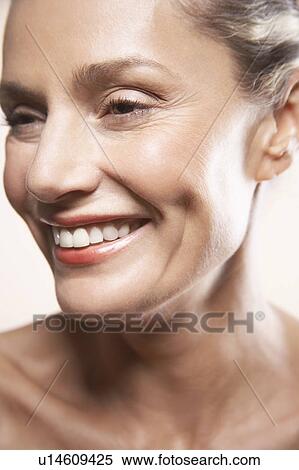 Beauty portrait of mature woman smiling View Large Photo Image Stock Photography - Beauty portrait of mature woman smiling. Fotosearch