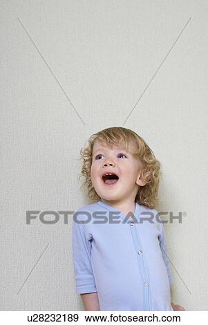 Boy (1-2) laughing, studio shot View Large Photo Image Stock Photo - Boy (1-2) laughing, studio shot. Fotosearch