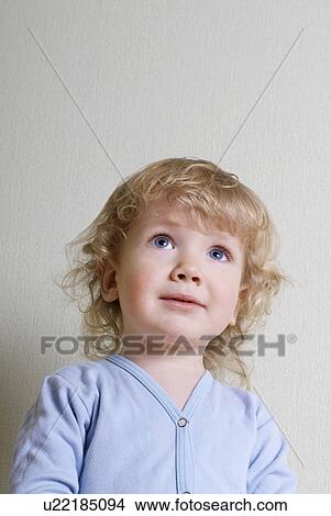 Boy (1-2) looking up, studio shot View Large Photo Image Picture - Boy (1-2) looking up, studio shot. Fotosearch