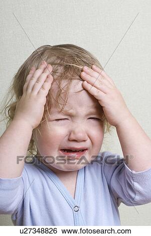 Stock Photograph - Boy (1-2 years) crying. Fotosearch