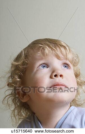 Boy (1-2 years) looking up, studio shot View Large Photo Image Stock Image - Boy (1-2 years) looking up, studio shot. Fotosearch