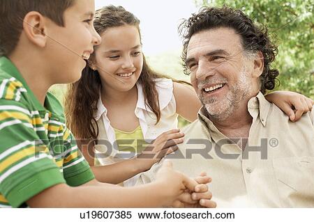 Boy (7-9) and girl (10-12) with grandfather. View Large Photo Image Stock Photography - Boy (7-9) and girl (10-12) with grandfather.. Fotosearch