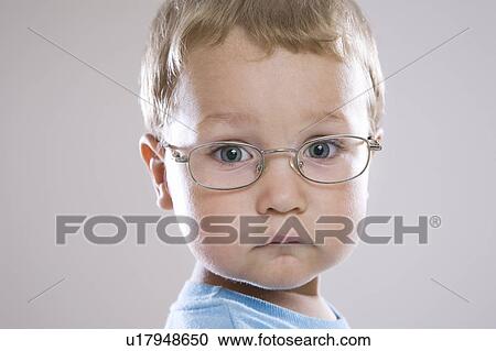 Boy in glasses, portrait View Large Photo Image Stock Image - Boy in glasses, portrait. Fotosearch