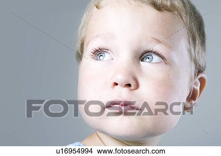 Picture - Boy looking up. Fotosearch