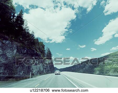 Stock Photograph - Car on highway. Fotosearch