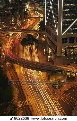 China, Hong Kong, Blurred traffic at night View Large Photo Image Stock Photo - China, Hong Kong, Blurred traffic at night. Fotosearch