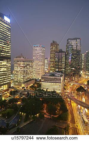 Picture - China, Hong Kong, elevated view of illuminated cityscape. Fotosearch