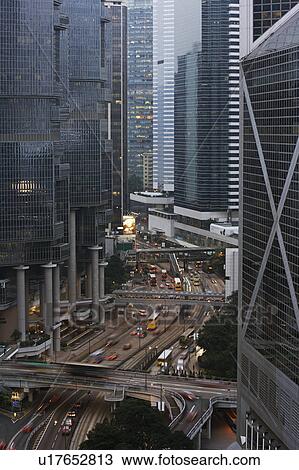 Stock Image - China, Hong Kong, office buildings and street, elevated view. Fotosearch