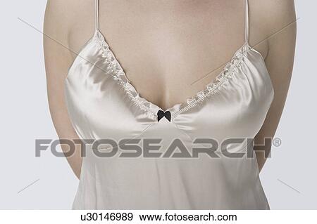 Stock Photo - Cleavage of sexy nightshirt. Fotosearch