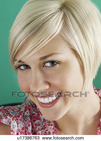Stock Image - Close-up portrait of young woman. Fotosearch