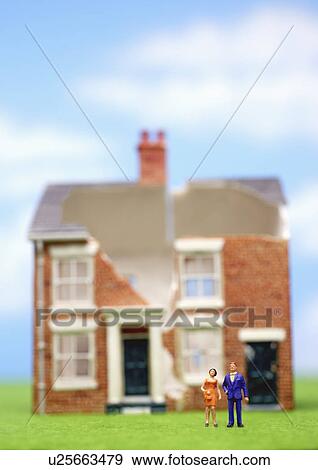 Couple in front of brick house View Large Photo Image Stock Photo - Couple in front of brick house. Fotosearch