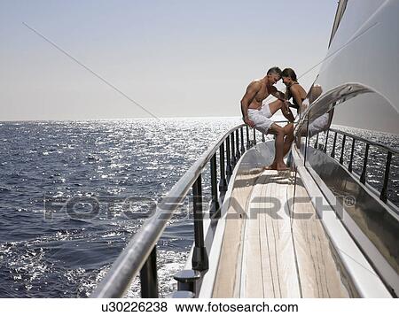 Stock Photo - Couple on a Boat. Fotosearch