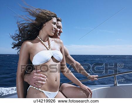 Stock Photograph - Couple on a Boat. Fotosearch