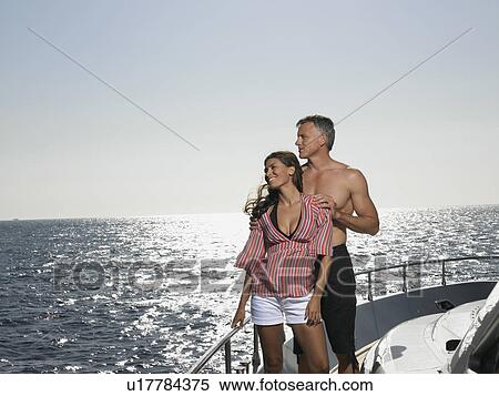 Stock Photography - Couple on a Boat. Fotosearch