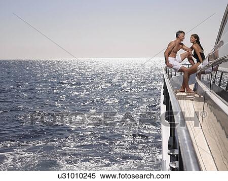 Stock Photography - Couple on a Boat. Fotosearch