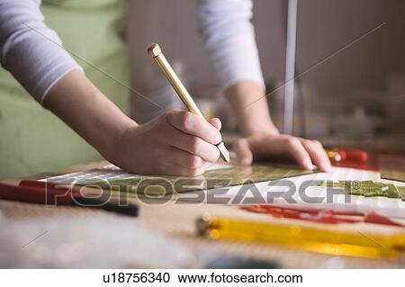 Craftswoman marking glass View Large Photo Image Stock Image - Craftswoman marking glass. Fotosearch