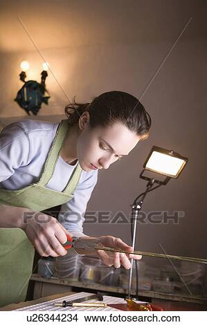 Craftswoman working with glass View Large Photo Image Picture - Craftswoman working with glass. Fotosearch
