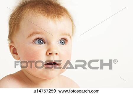 Curious baby with fuzzy hair and open mouth View Large Photo Image Stock Photo - Curious baby with fuzzy hair and open mouth. Fotosearch