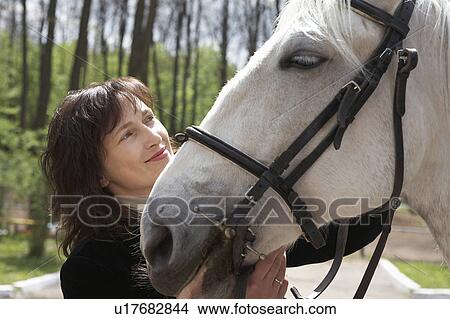 Equestrian With Her Horse View Large Photo Image Picture - Equestrian With Her Horse. Fotosearch