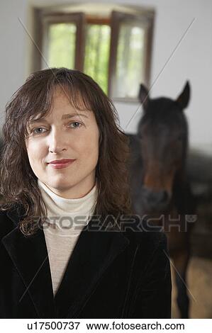 Equestrian With Her Horse View Large Photo Image Stock Photo - Equestrian With Her Horse. Fotosearch