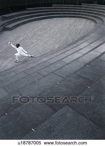 Fencer practising in the Scoop amphitheatre, London, England, elevated view View Large Photo Image Stock Photography - Fencer practising in the Scoop amphitheatre, London, England, elevated view. Fotosearch