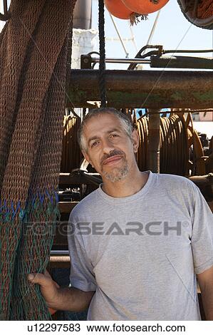 Fisherman on Boat by Fishing Net View Large Photo Image Stock Image - Fisherman on Boat by Fishing Net. Fotosearch