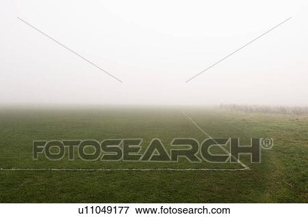 Fog above soccer field View Large Photo Image Stock Photo - Fog above soccer field. Fotosearch