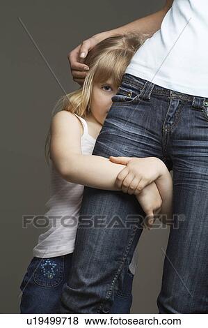 Girl (3-4) embracing mother (mid section) View Large Photo Image Stock Photo - Girl (3-4) embracing mother (mid section). Fotosearch