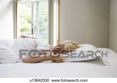 Gitl (7-9) sleeping in bed View Large Photo Image Stock Image - Gitl (7-9) sleeping in bed. Fotosearch
