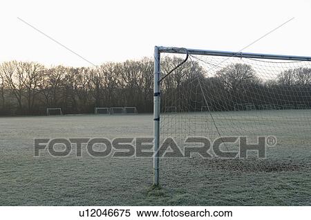 Stock Photography - Goal post on empty soccer field. Fotosearch