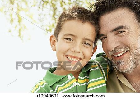 Grandfather and Grandson (7-9), close-up portrait. View Large Photo Image Stock Image - Grandfather and Grandson (7-9), close-up portrait.. Fotosearch