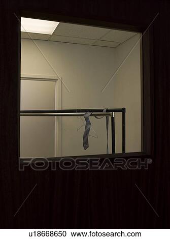 Stock Image - Hanging Tangled in Office. Fotosearch