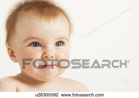Stock Image - Happy baby with fuzzy hair. Fotosearch