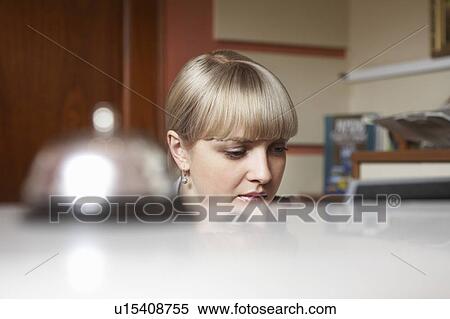 Stock Photography - Hotel Receptionist. Fotosearch