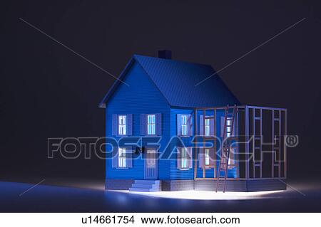 Illuminated model house View Large Photo Image Picture - Illuminated model house. Fotosearch