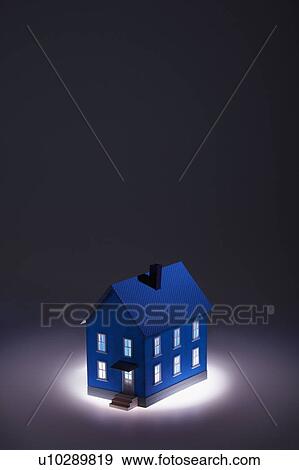 Stock Photo - Illuminated model house. Fotosearch