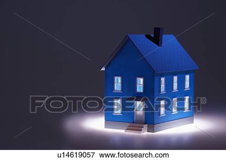 Stock Photo - Illuminated model house. Fotosearch