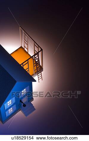 Picture - Illuminated model of house. Fotosearch