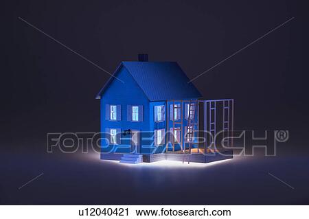 Stock Image - Illuminated model of house. Fotosearch